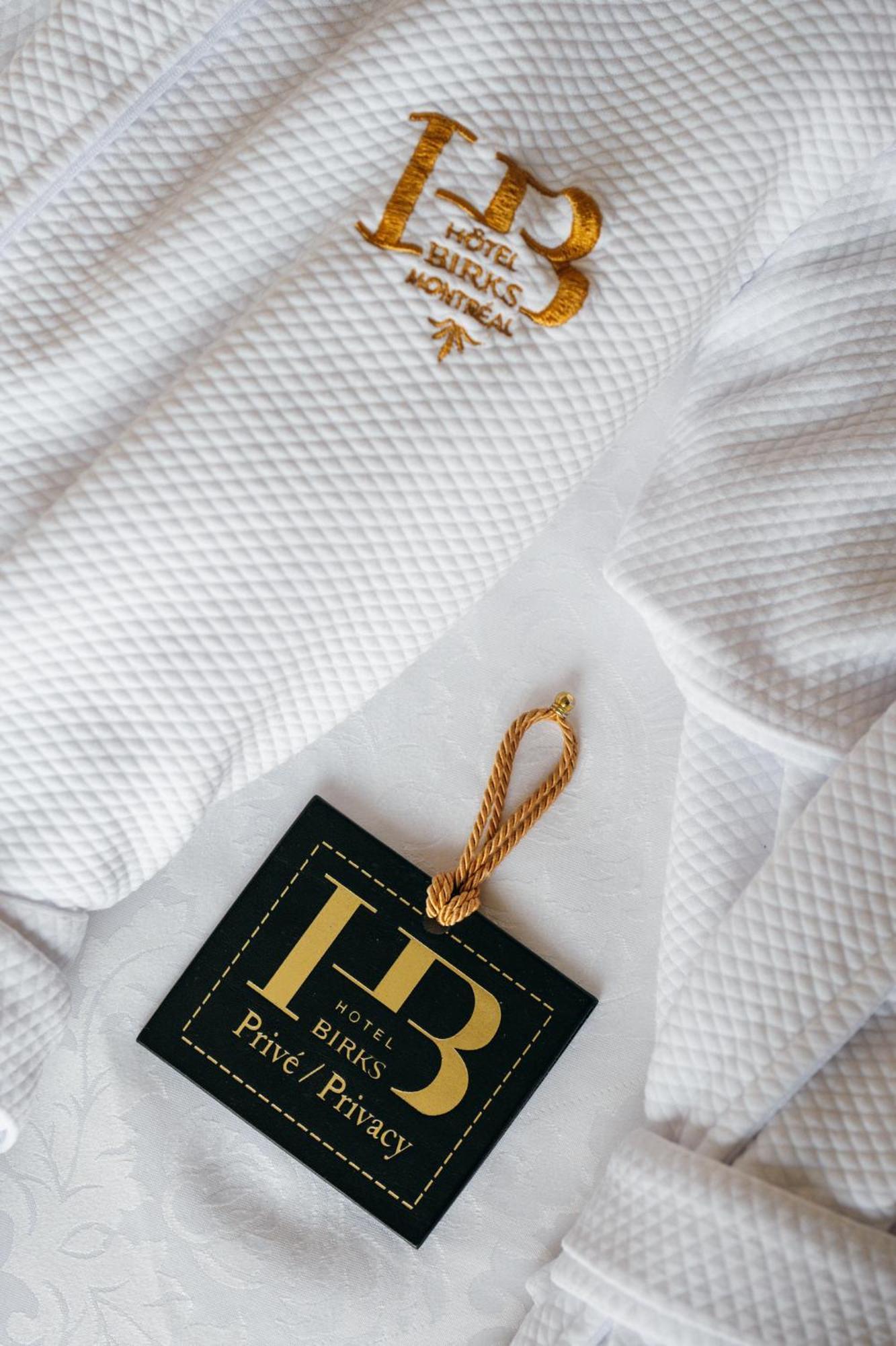 Hotel Birks Montréal Exteriör bild A gold-plated bookmark